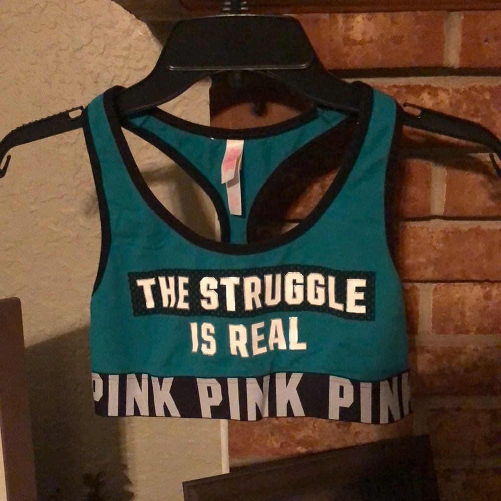 Worn once PINK by Victoria’s Secret Sports bra. The struggle is real logo. Teal